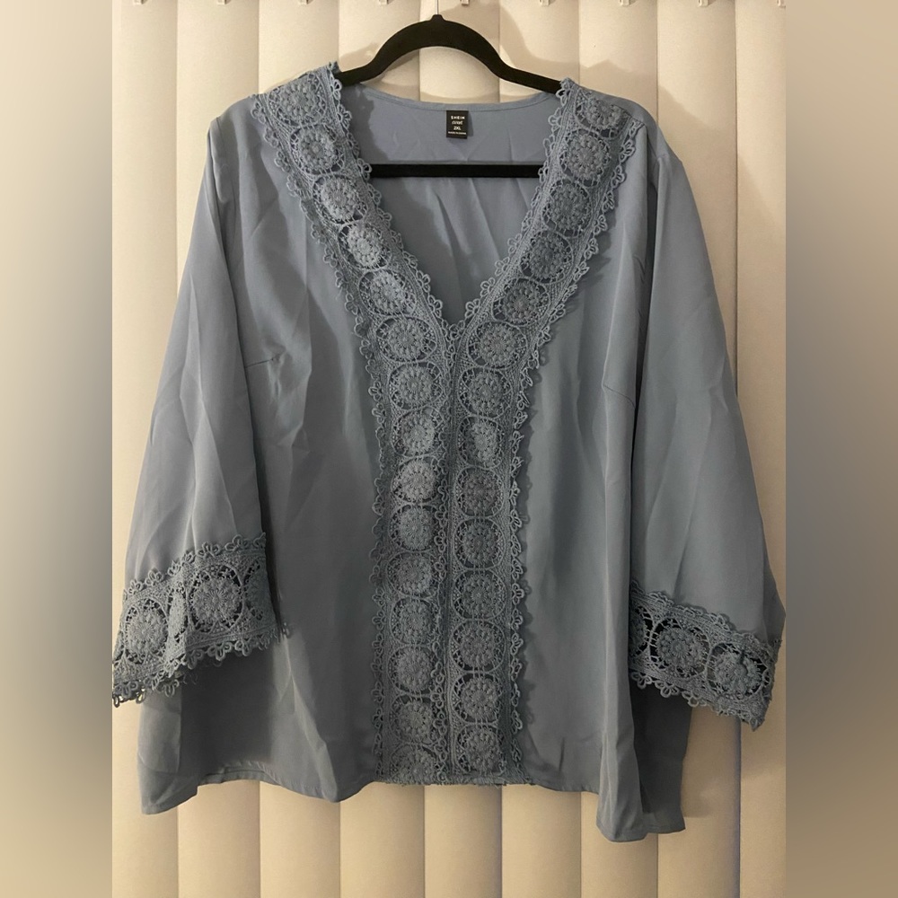 Shein blue blouse with lace accents and sleeve cuffs. Size 2xl.